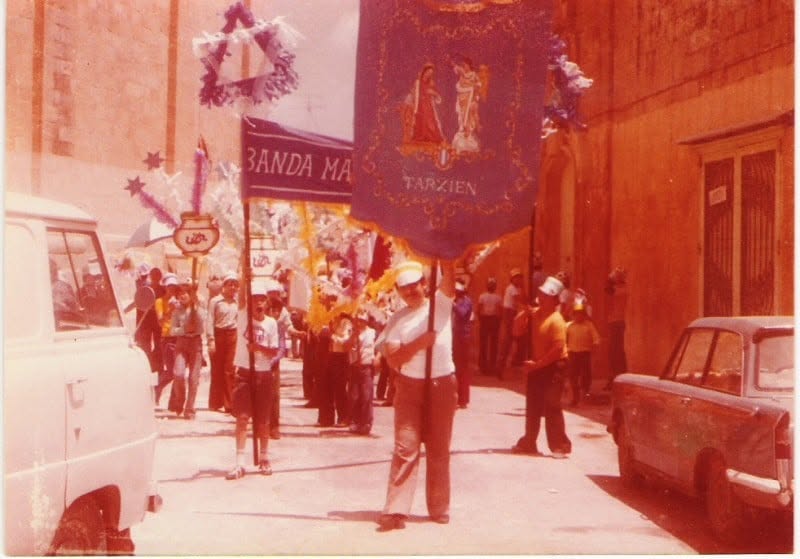 A banner carried along the street