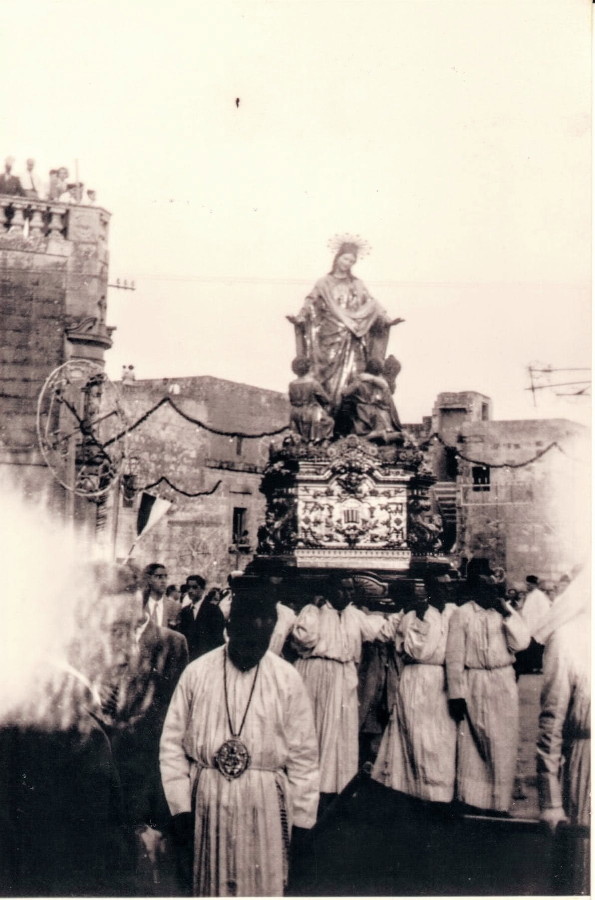 A statue carried in procession