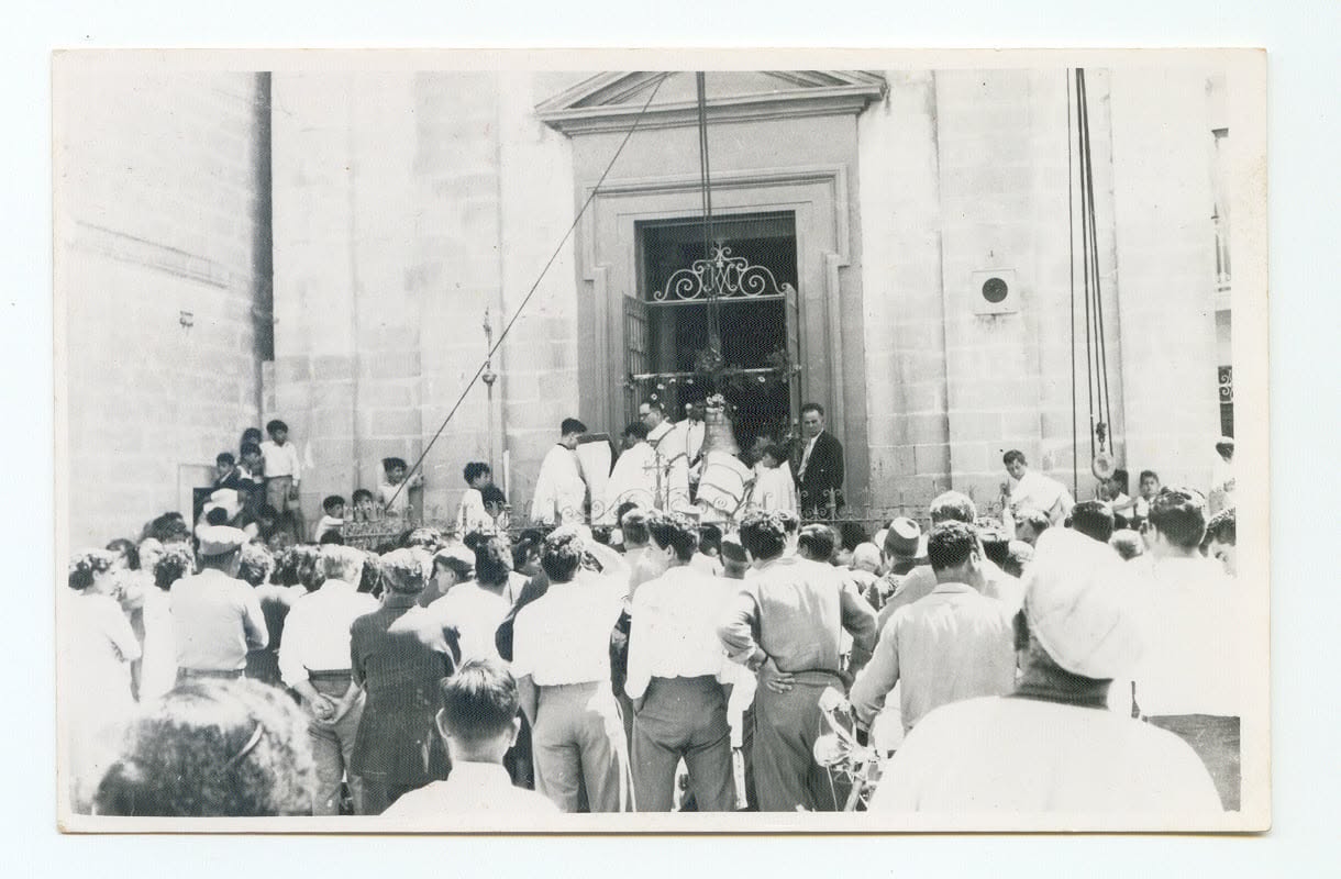 A crowd outside a church entrance