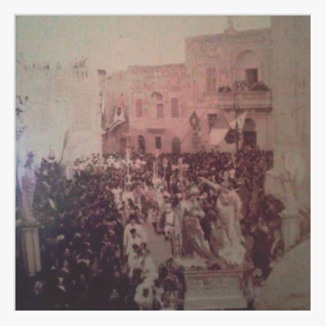 A procession with Annunciation statues