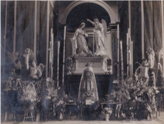Annunciation statues displayed inside a church