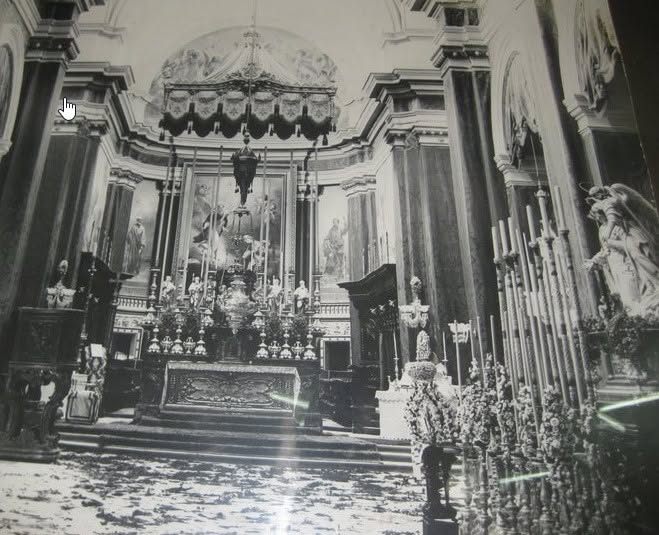 An altar with candles and flowers
